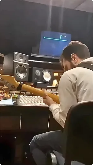 Producer at mixing desk